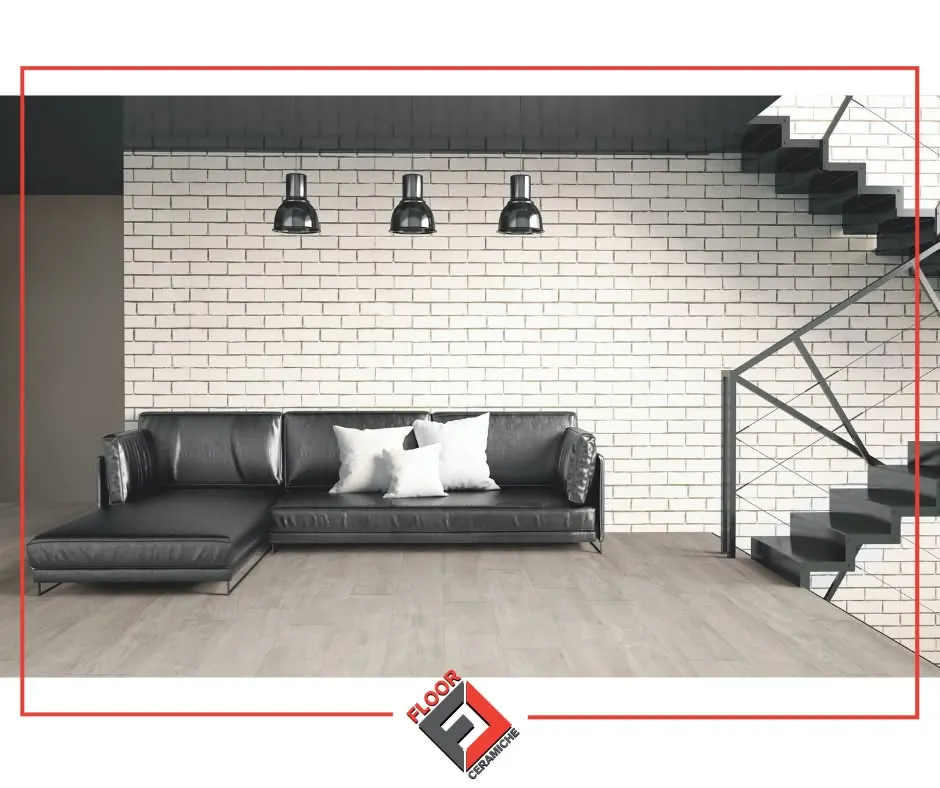 Soggiorno con pavimento effetto legno grigio